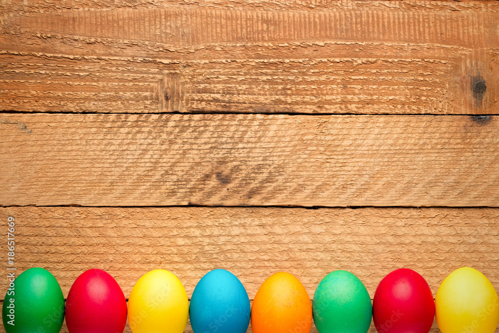 Easter concept painted eggs on wooden table for holiday with place for text pattern with frame Easter concept painted eggs on wooden table for holiday with place for text pattern with frame