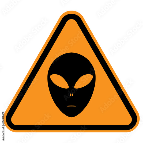 WARNING ALIENS sign. Martian head silhouette in yellow and black triangle. Vector icon.
