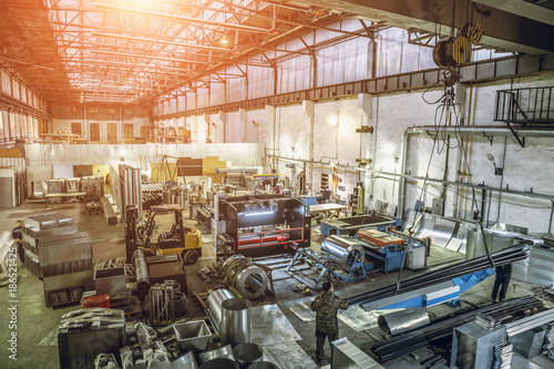 Interior of manufacturing metalworking factory warehouse with  modern equipment tools and machines