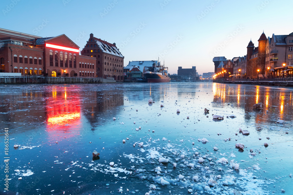 Old town in Gdansk with Motlawa river at dusk, Poland
