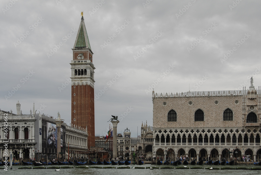San Marco embankment and the famous Doge Palace in San Marco square in Venice, Italy