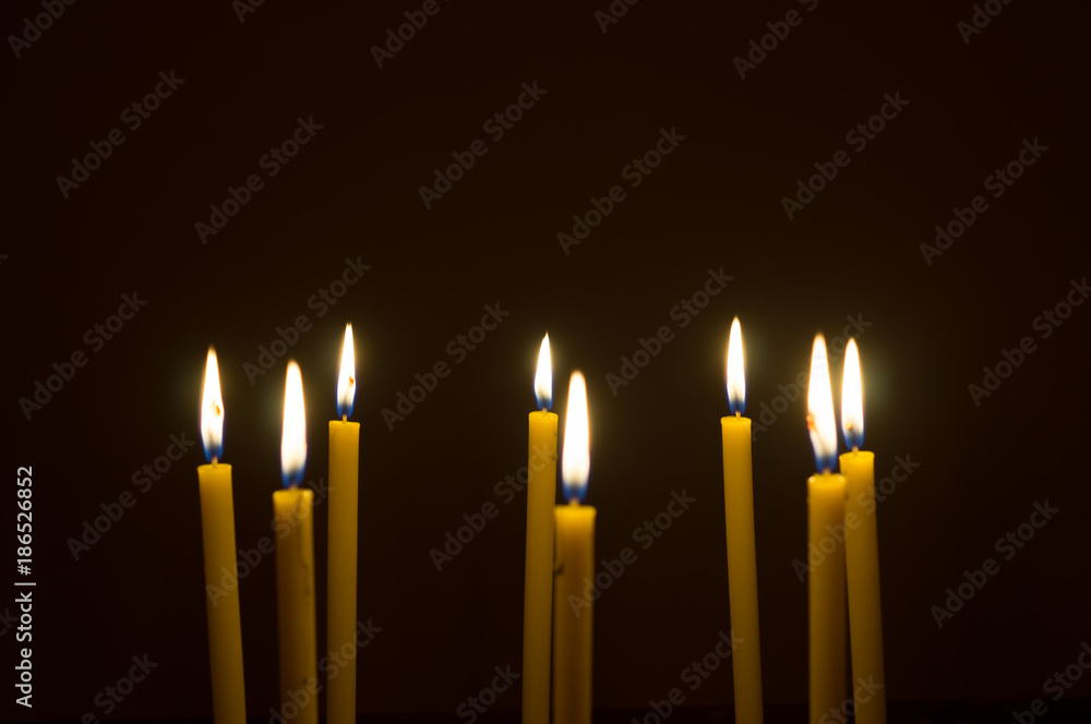 marvelous candle light on dark background to help lead people to the goal marvelous candle light on dark background to help lead people to the goal