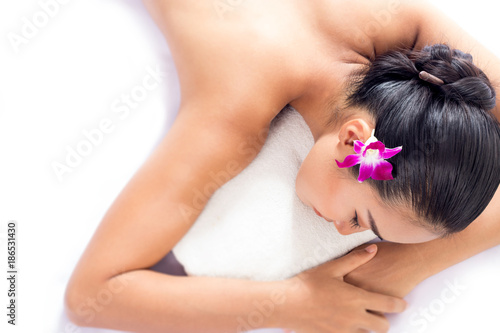 Women are relaxing massage at the spa.
