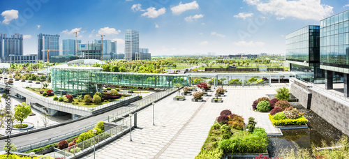 Photography City park under blue sky with Downtown Skyline in the Background