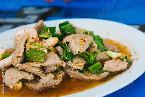 Spicy pork liver salad is original Northeast Thai food.