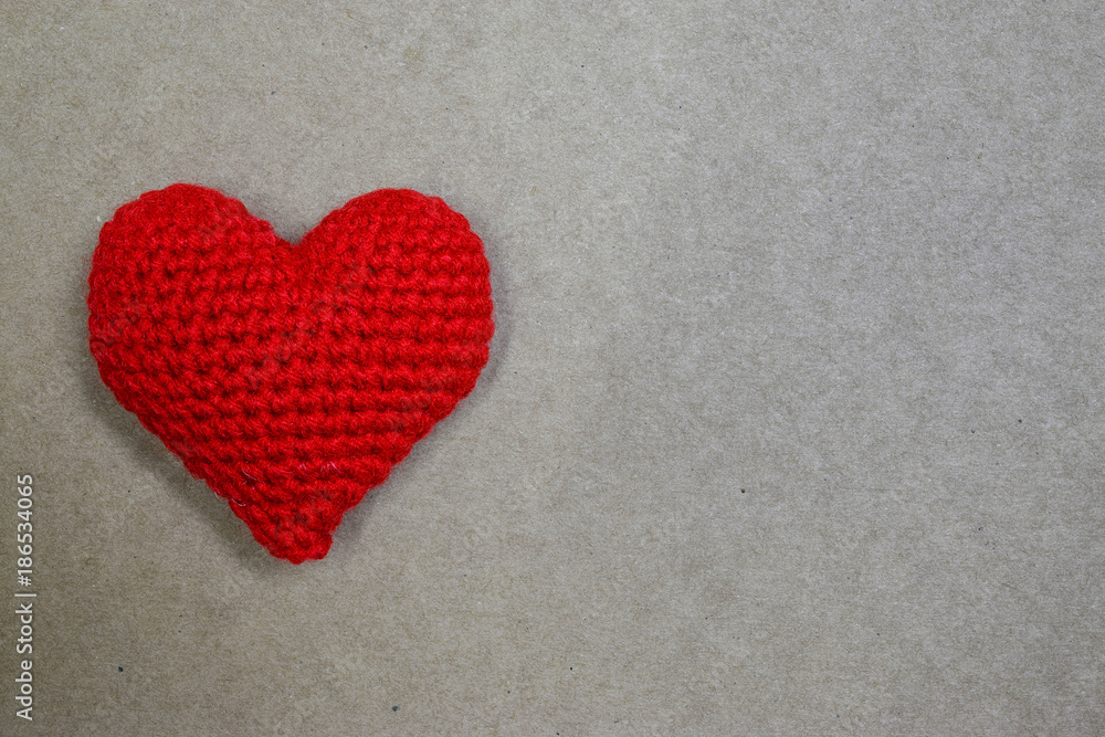Red heart on paper with copyspace