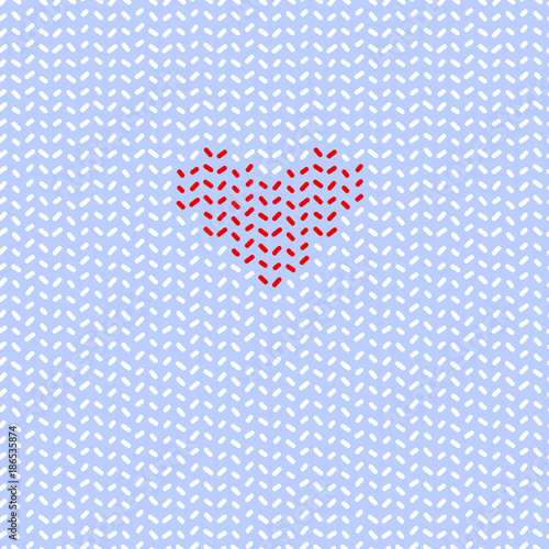 Simple knitted heart on blu...