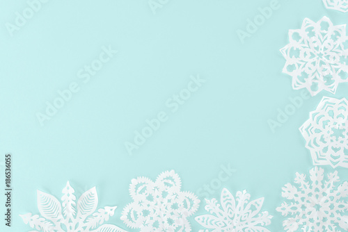 Canvastavla decorative christmas snowflakes, isolated on light blue with copy space
