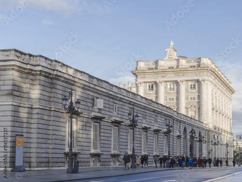 Tourists at The entrance of the Royal palace. Madrid, Spain.