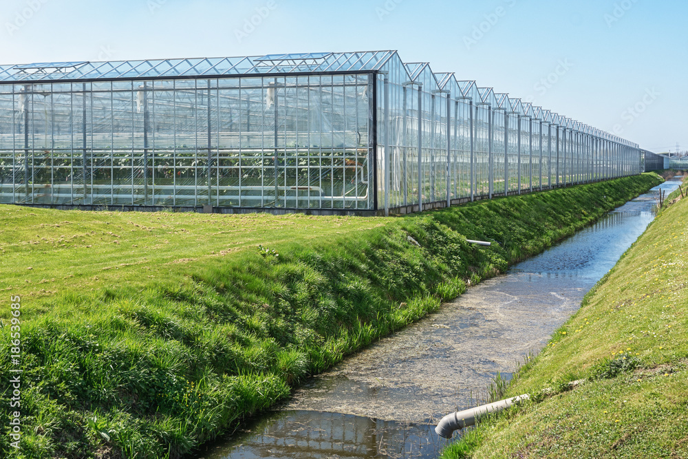 The outside of a Large greenhouse in the Netherlands