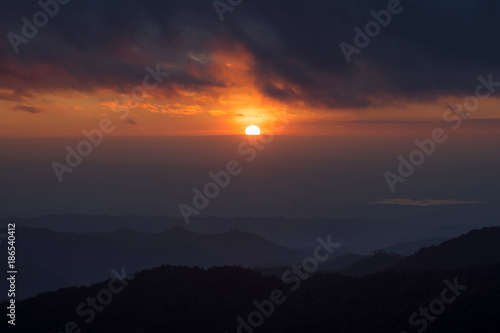 Landscape of beautiful sunset, sunrise the sun, fog and cloud are on the top of mountains, favor place for tourism who like hiking or trekking to see view, Doi Langka Lung, Thailand 