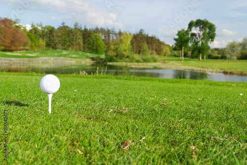 Golf ball on the tee, golf course of Adare in Ireland