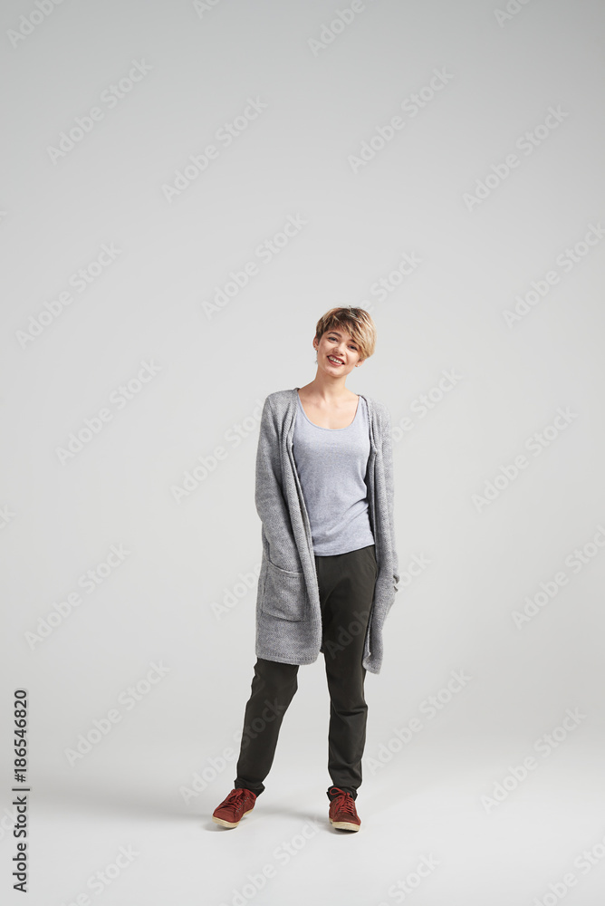Woman with bob haircut styling posing at camera Woman with bob haircut styling posing at camera