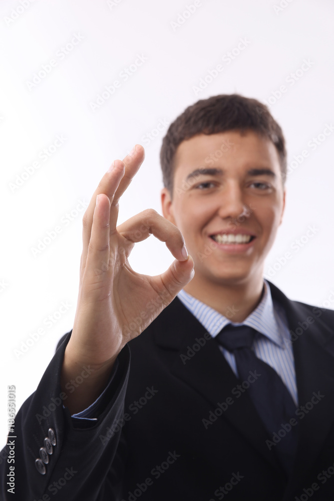Happy smiling young businessman with okay gesture, Happy smiling young businessman with okay gesture,