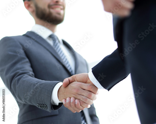 Businessmen making handshake - business etiquette, congratulatio photo