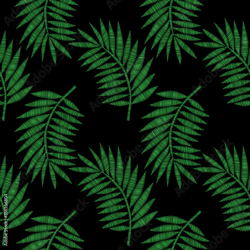 Seamless pattern with little green palm leaf embroidery stitches imitation
