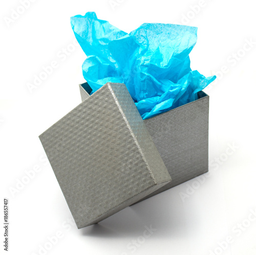 Silver gift box with open lid and blue tissue paper