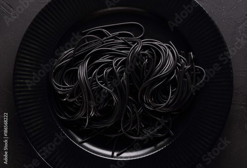 Black pasta in the black plate