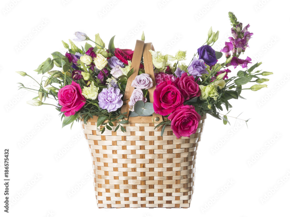 Obraz basket with flowers on a white background