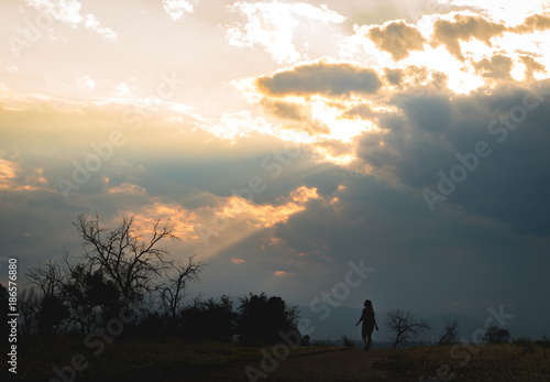 Fototapeta Naklejka Na Ścianę i Meble -  Girl and Sunset