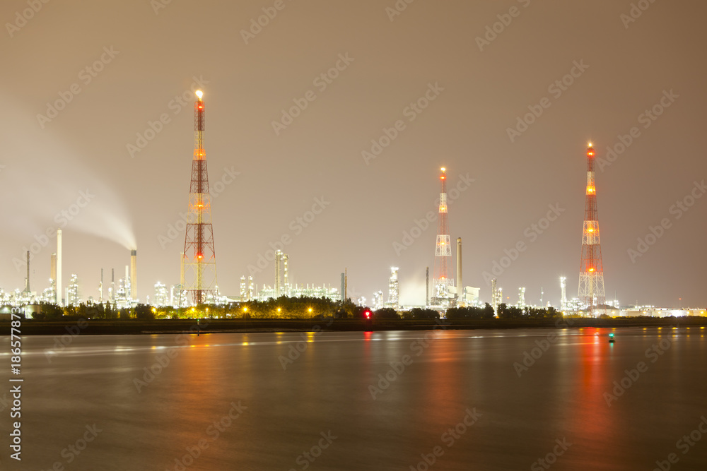 Refinery And Flare Stack At Night