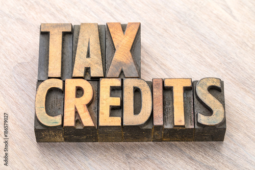 tax credits word abstract in wood type