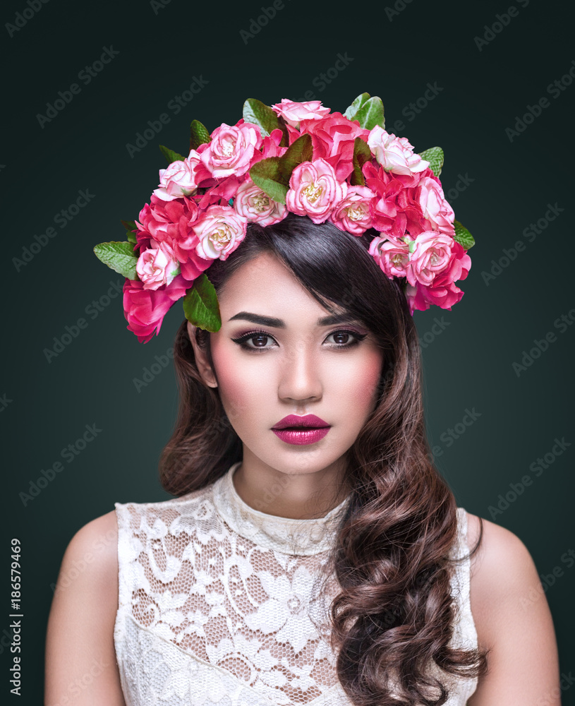Fototapeta premium Portrait of beautiful asian woman with flower wreath