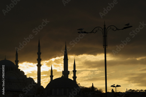 Silhouettes of mosques at sunset at Istanbul, Eminonu.