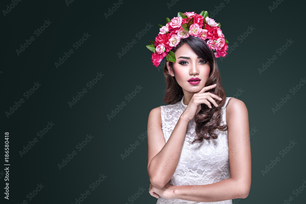 Portrait of beautiful asian woman with flower wreath