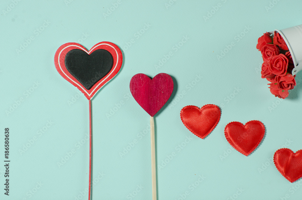 Different hearts on the day of the holy valentine, on a light background