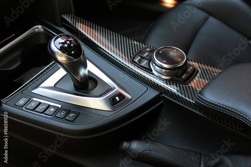 Car interior. Gear shift. Black. Inside car detail.