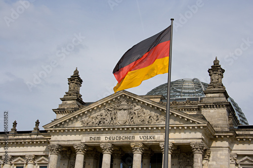 Berlin Reichstag And German Flag