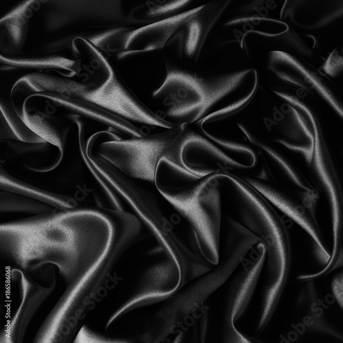 Abstract background of luxury cloth wave,grunge lame.Texture of sheet crumled.