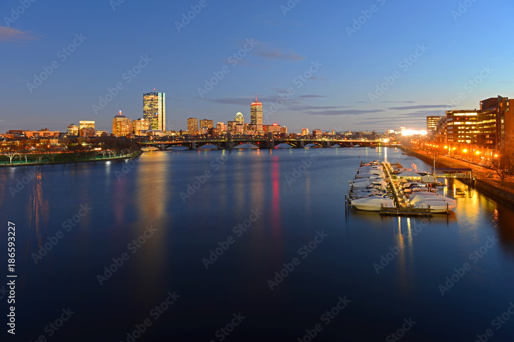 Fototapeta premium Boston Back Bay Skyline John Hancock Tower and Prudential Center night scenes, viewed from Cambridge, Boston, Massachusetts, USA.