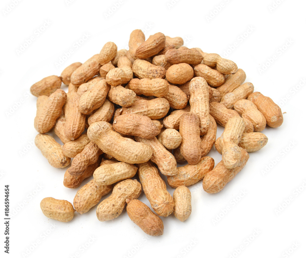 Composition from nuts on the white isolated background Composition from nuts on the white isolated background