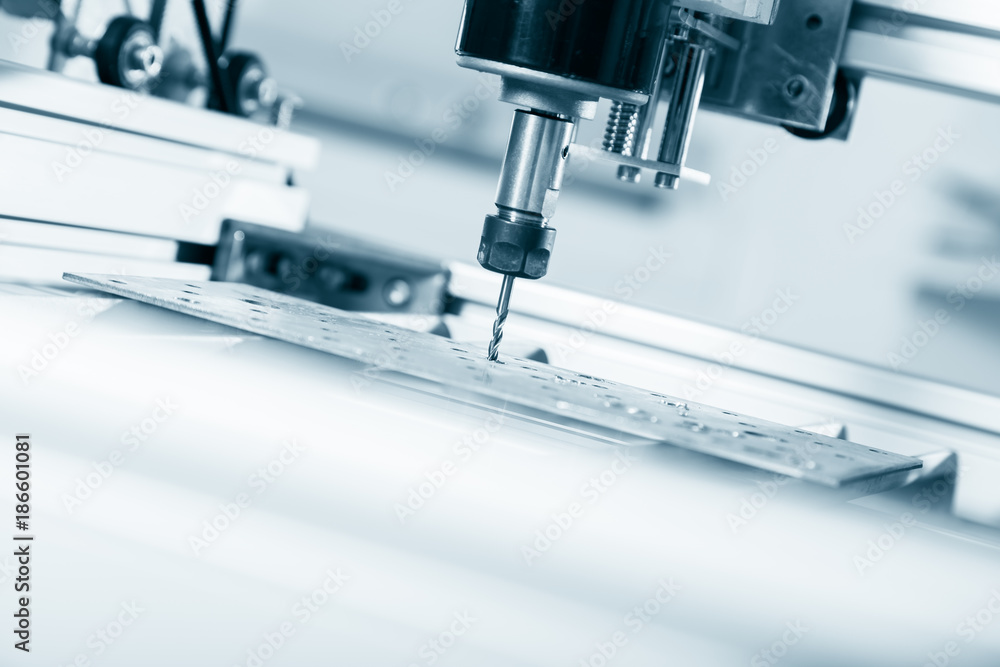 Milling machine working on steel detail. Milling machine working on steel detail.