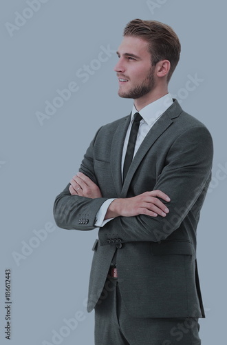 Portrait of a elegant handsome business man on gray background. photo