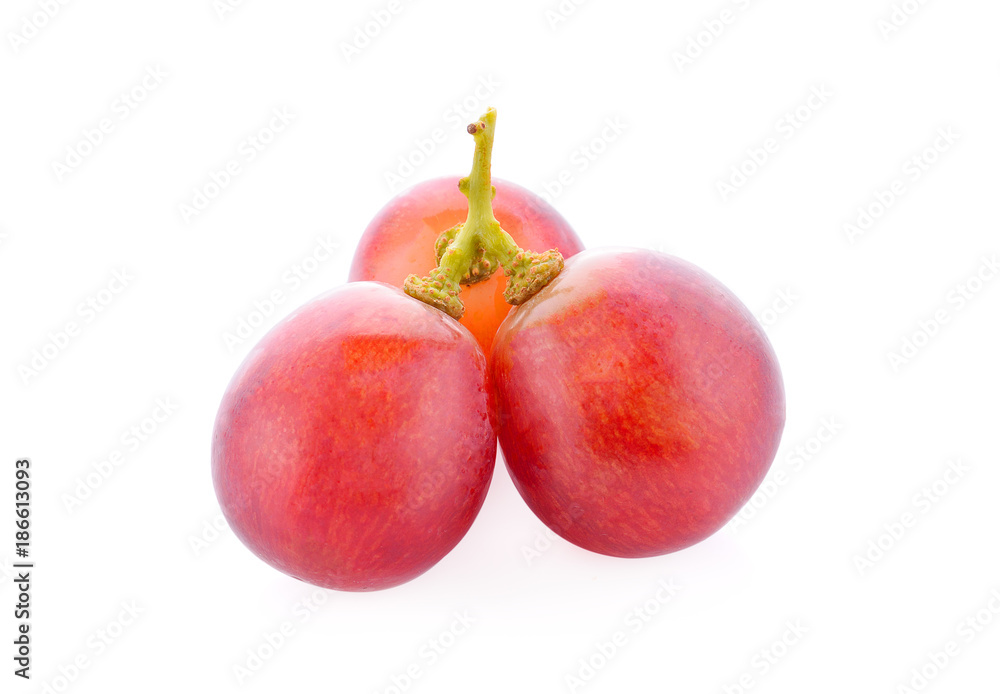 Fresh red grapes isolated on white background. Fresh red grapes isolated on white background.