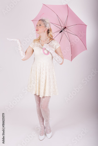 girl with pink umbrella