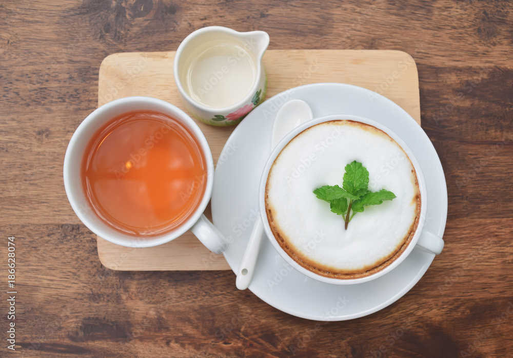 Coffee on wooden table With tea and water. Coffee on wooden table With tea and water.
