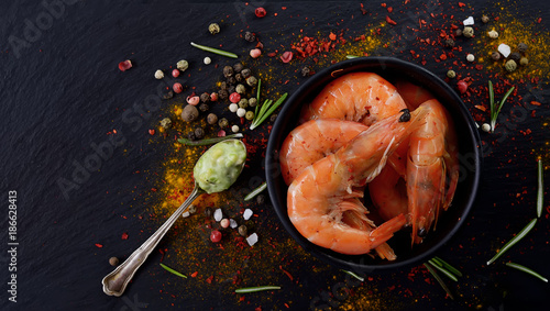 grilled shrimp on a black background