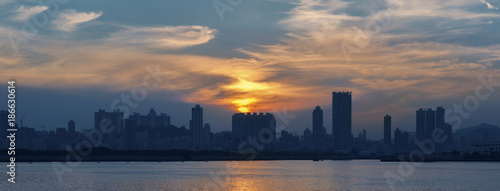 Panorama of Skyline of Hong Kong city under sunset © leeyiutung