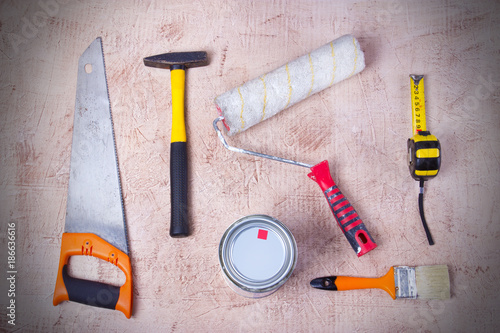 Working tools on pastel textured background. top view photo