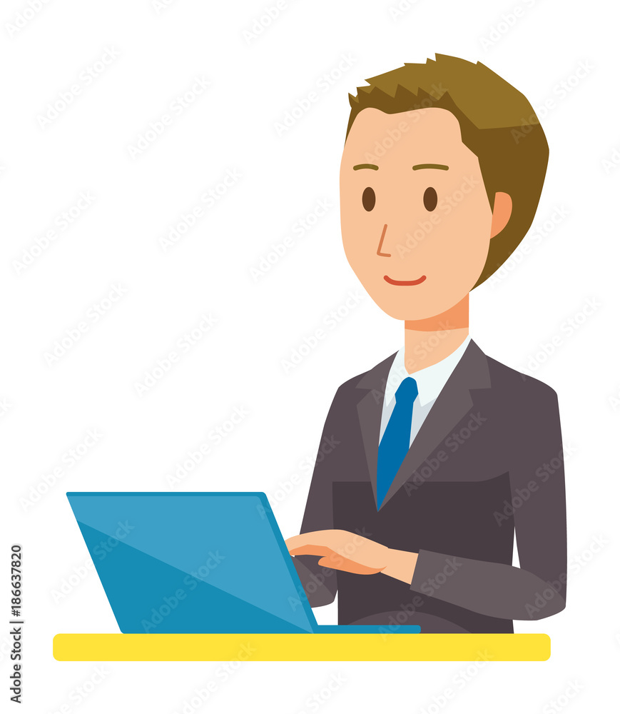 A young businessman is operating a laptop computer A young businessman is operating a laptop computer