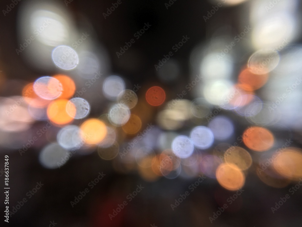 Abstract black background with blur bokeh light effect
