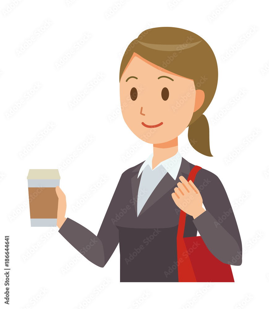 A business woman in a suit has coffee A business woman in a suit has coffee