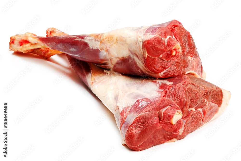 Fresh raw meat of a leg young lamb on white background 