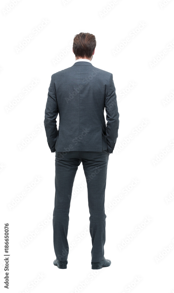 rear view . businessman looking at copy space rear view . businessman looking at copy space