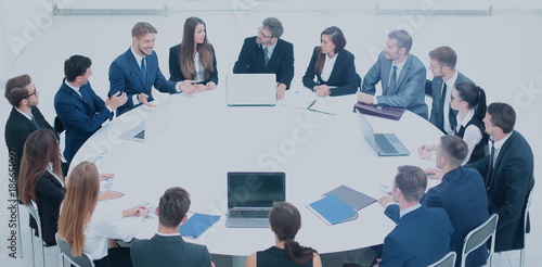 Investment Director holds a meeting with the business partners, 