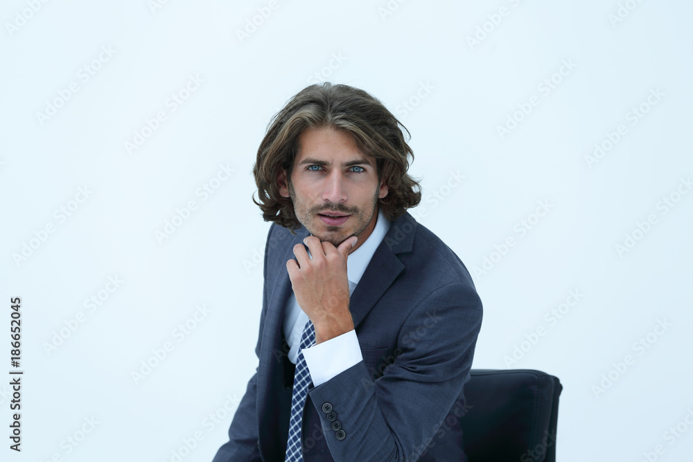 Portrait businessman sitting on chair and thinking Portrait businessman sitting on chair and thinking